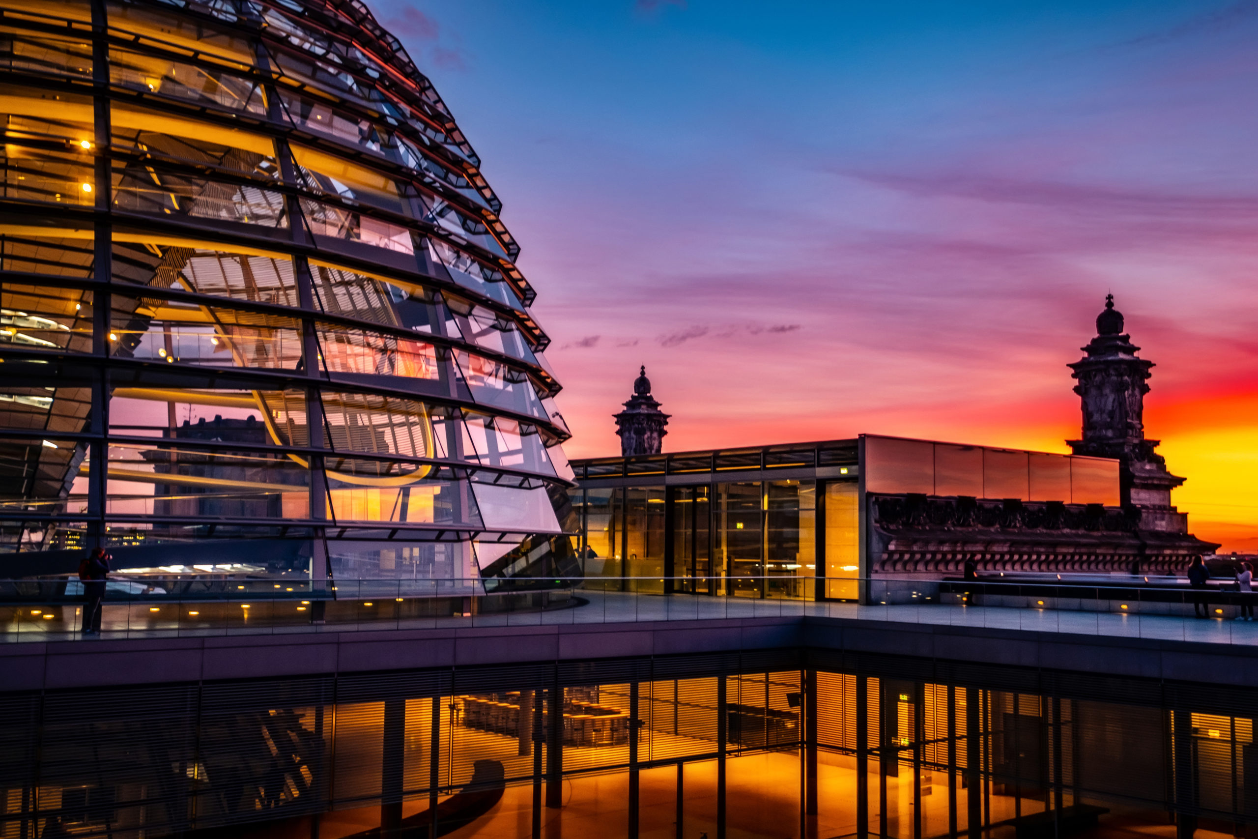 Reichstag large glass dome and roof terrace at sunset